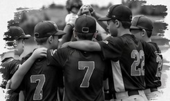 Youth team huddled together