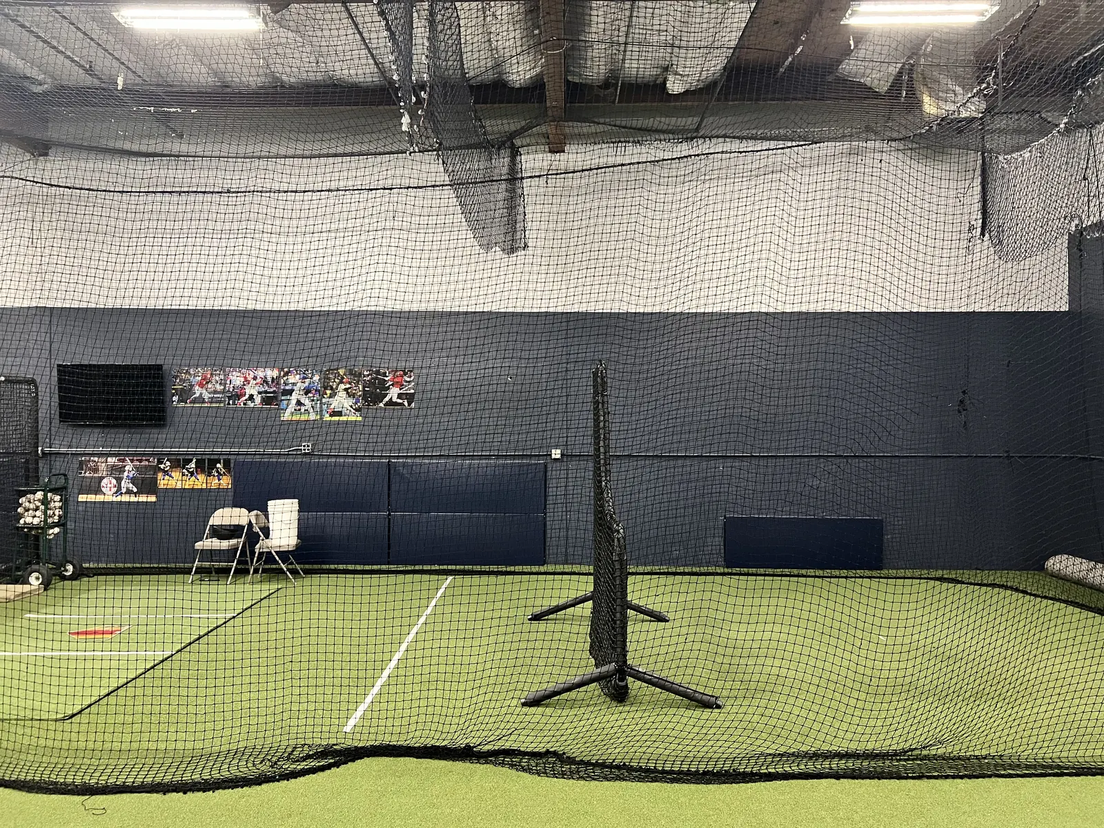 Indoor batting cage with hitting tee at 503 Baseball in Milwaukie, Oregon